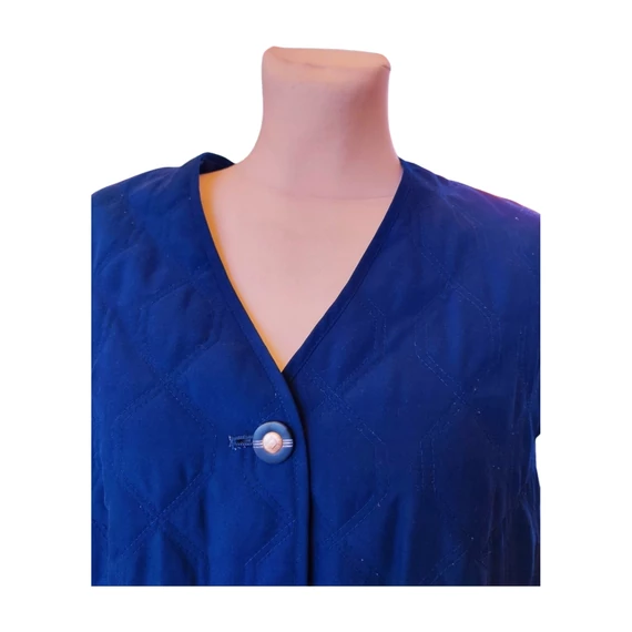 Sötétkék steppelt női mellény